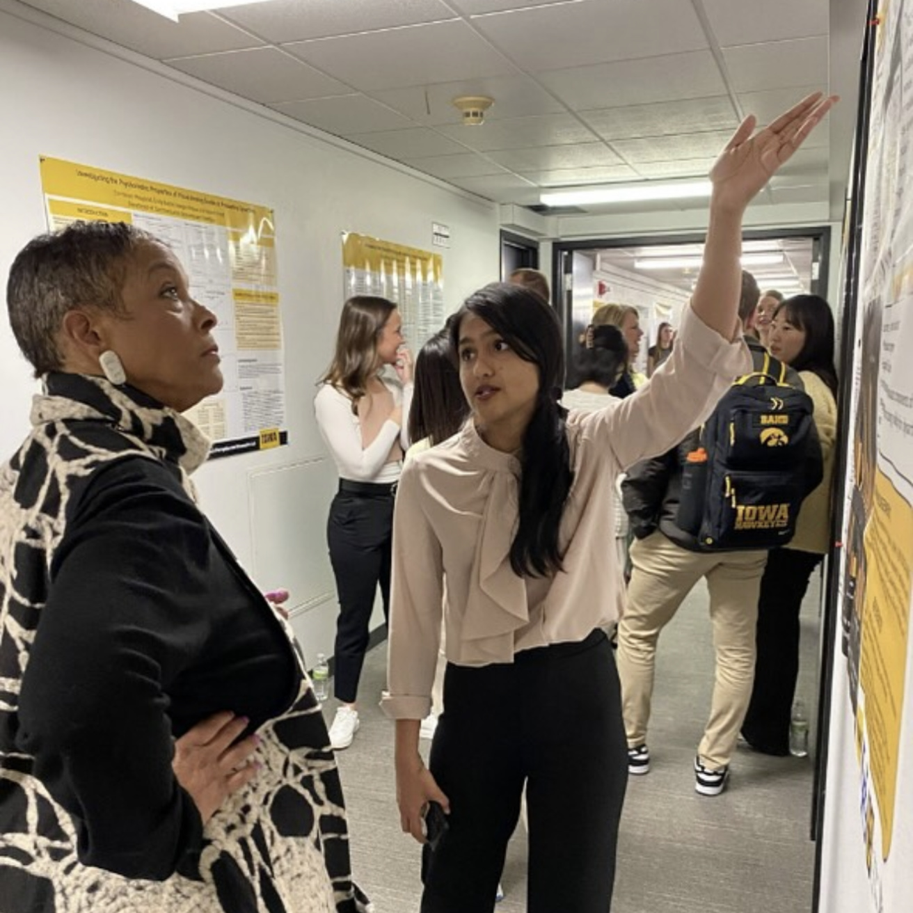 Deepthi Crasta presents her research to Dr. Bernadette Mayfield-Clarke